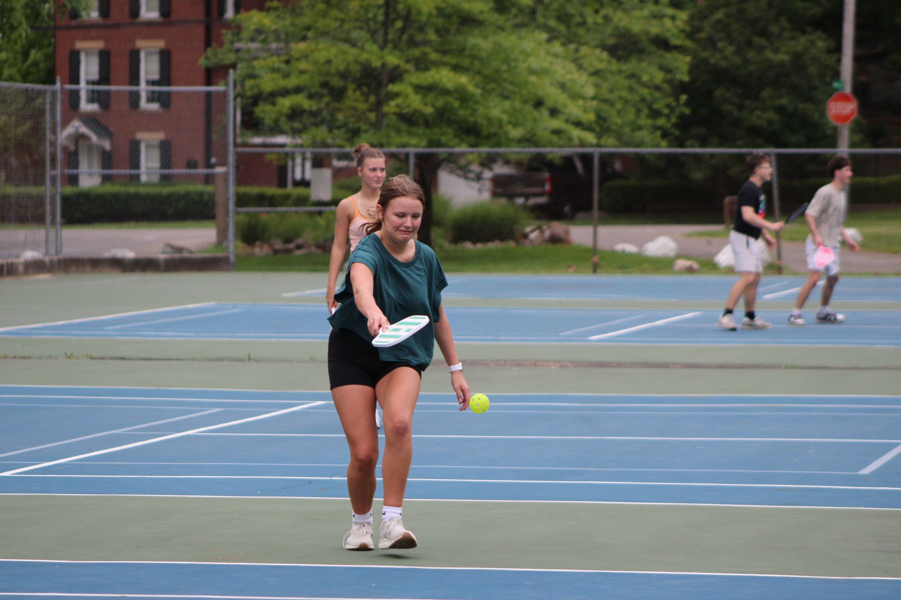 Players enjoying a pickleball game — illustrative photography